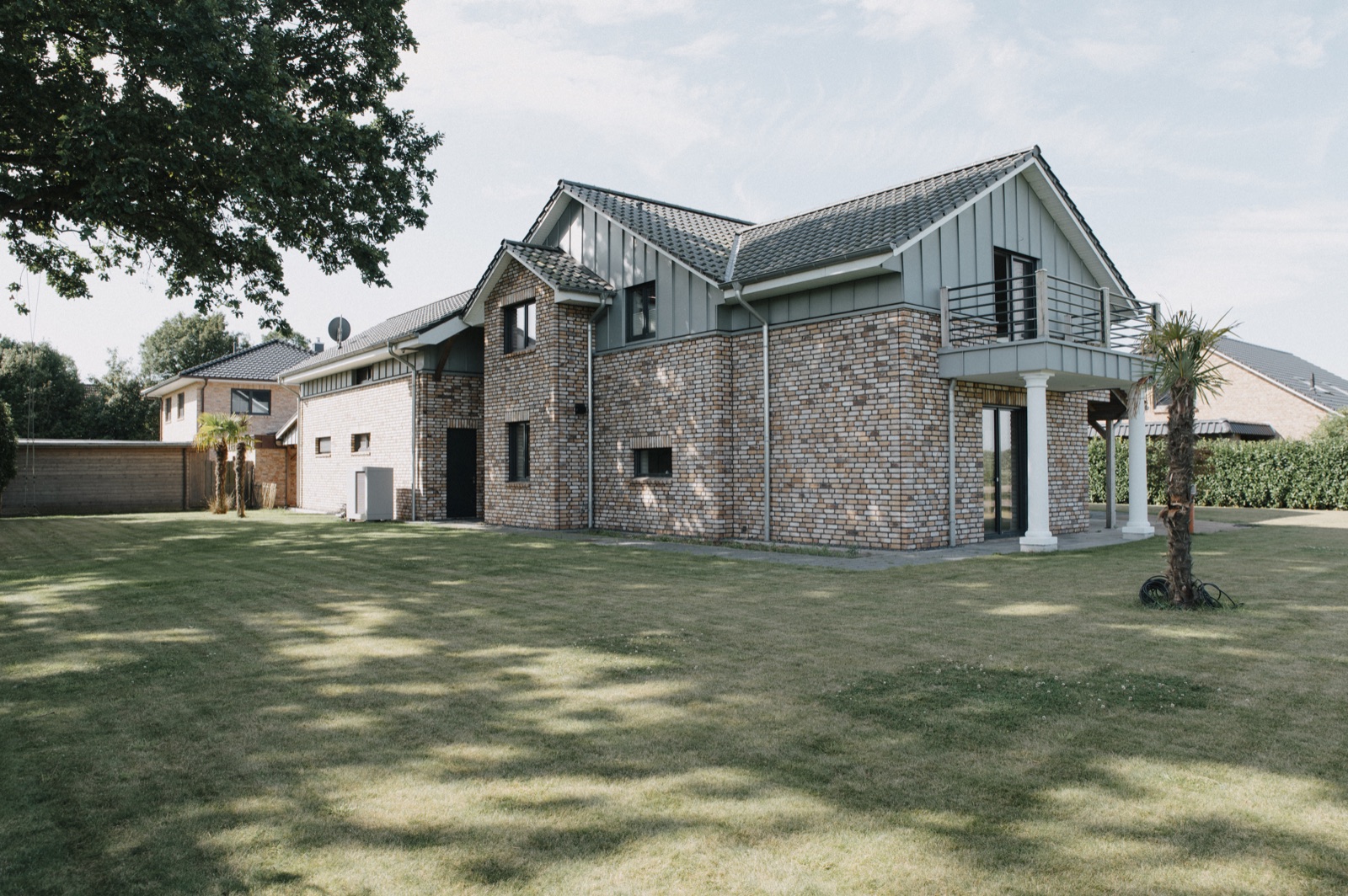 Musterhaus – Klinker mit Metalldach